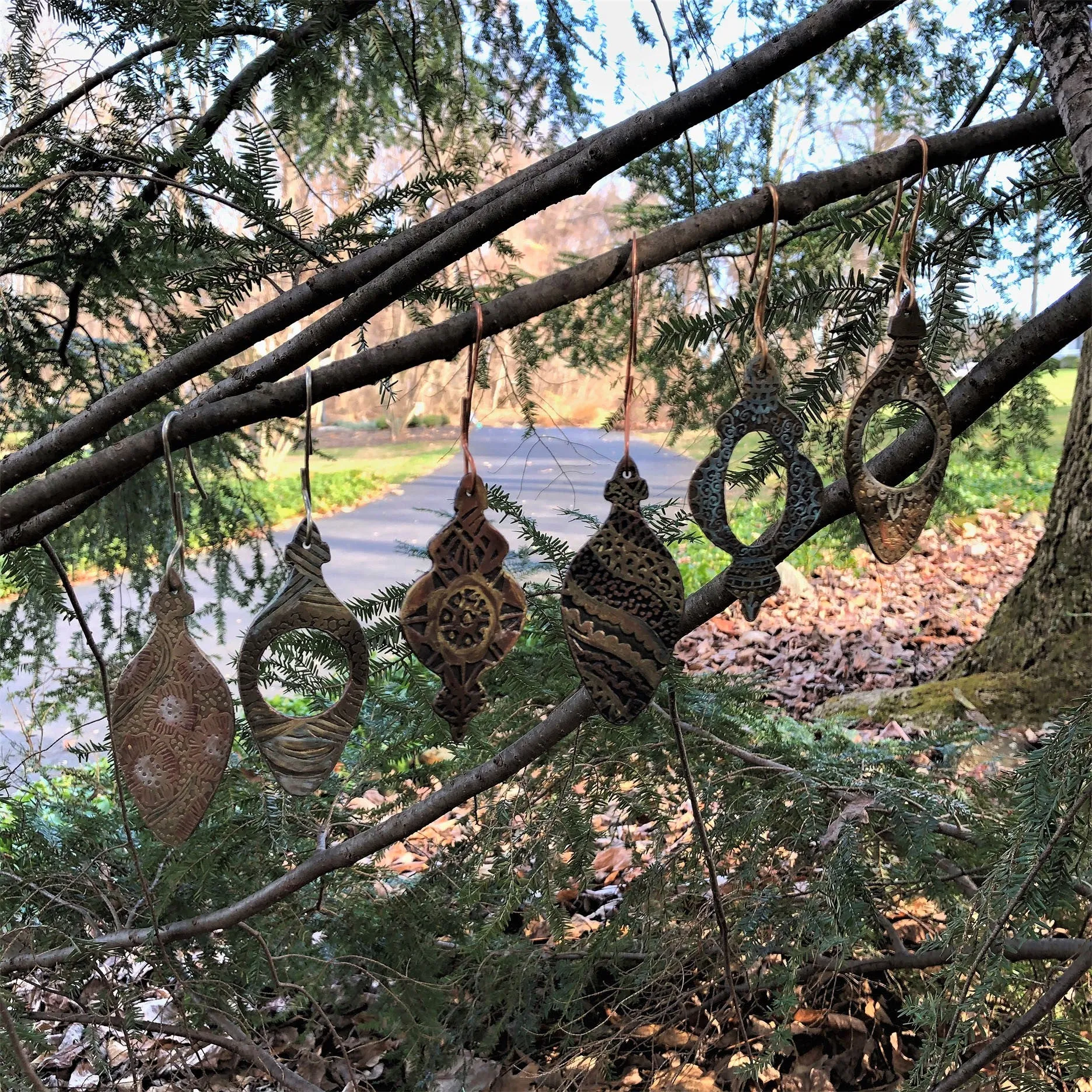 Custom Hand Drawn and Etched Holiday Ornaments in Red Brass, Copper and Silver Nickel